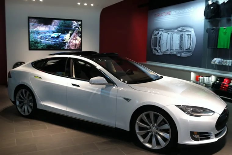 One of the two Tesla Model S sedans on display in the showroom at the Plaza of King of Prussia, which opened Friday, May 17, 2013.