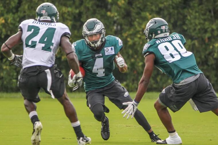 Rashard Davis returns a punt during practice with the Eagles on Monday.