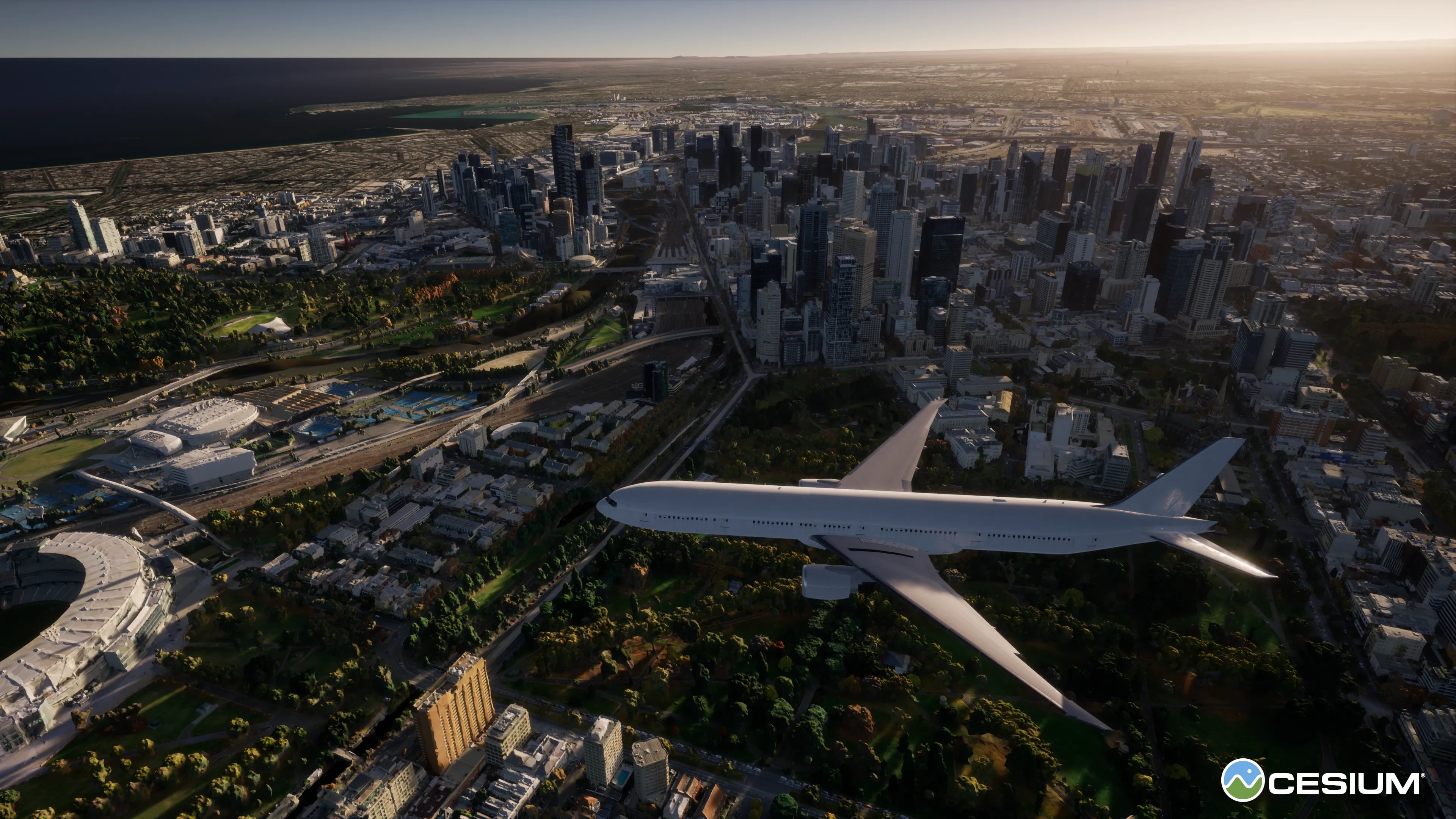 3D model of an airplane interacting with location data of Melbourne, Australia, provided by Aerometrex, a surveying services company, using Cesium's software platform.
