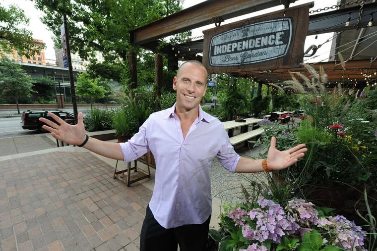 Michael Schulson, owner of the new Independence Beer Garden, on Sixth Street between Market and Chestnut Streets. "You literally don't feel like you're in Philadelphia," he said. CLEM MURRAY / Staff Photographer