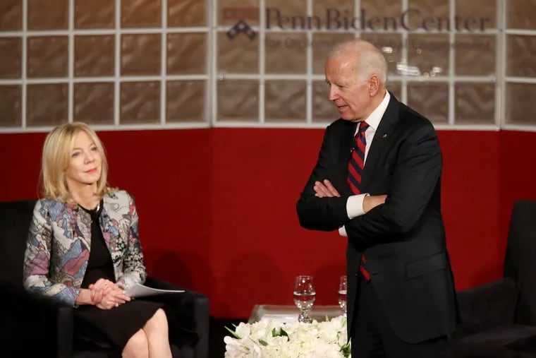 University of Pennsylvania President Amy Gutmann (left) listens as former Vice President Joe Biden answers a submitted question at the university's Irvine Auditorium in February. Biden is the Benjamin Franklin presidential practice professor at Penn.