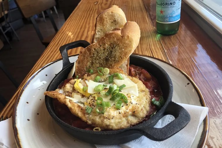 Fergese served in a cast-iron skillet at Two Eagles Cafe, 1401 S. 20th St.
