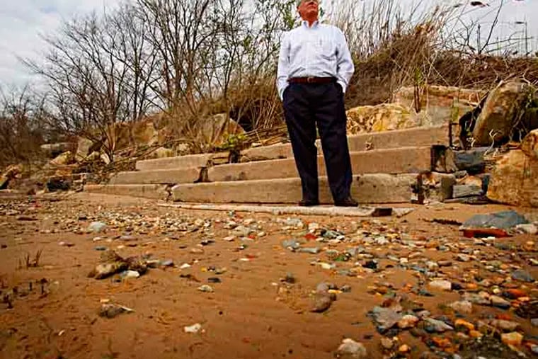 Harold M. West, owner of Deemers Beach in New Castle DE. stands on the old steps that lead from the beach to the park and bath house.  Deemers Beach (New Castle, DE.) was a paradise on the Delaware River, a park resort where you could swim and boat in wide sunny tidal Delaware Bay in the late 1920s.  Boats form Philadelphia made frequent stops. ( MICHAEL S. WIRTZ / STAFF PHOTOGRAPHER ). April 10, 2013.