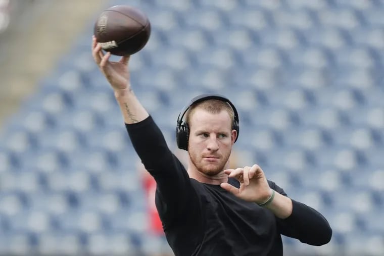 Eagles quarterback Carson Wentz throws the football during pregame warmups before the Eagles play a preseason game against the New England Patriots at Gillette Stadium in Foxborough, MA on Thursday, August 16, 2018.
