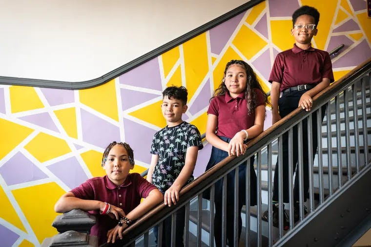 Left to right, fourth graders Devyn Smith, Ronald Perez, Cindy Hernandez, and Jayden Hughes, students at Sheridan Elementary in Kensington.
