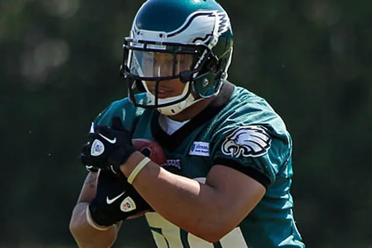 Eagles rookie Chris Polk is just one of seven players in Pac-12 history to rush for 4,000 yards. (Alex Brandon/AP Photo)