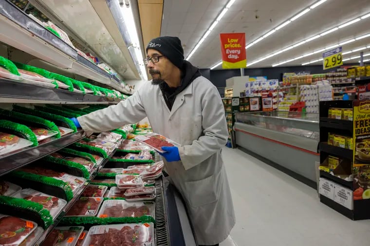 Mike Wiggins, butcher managing the meat display at Save-A-Lot at Renaissance Plaza, 1501 Atlantic Avenue, Atlantic City on Wednesday, Jan 17, 2024
