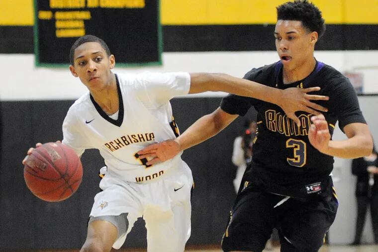 Archbishop Wood's Rashool Diggins #1 dribbles towards the basket as Roman Catholic's Lynn Greer III #3 defends in the first quarter Friday, February 09, 2018 at Archbishop Wood in Warminster, Pennsylvania. (WILLIAM THOMAS CAIN / For The Inquirer) 