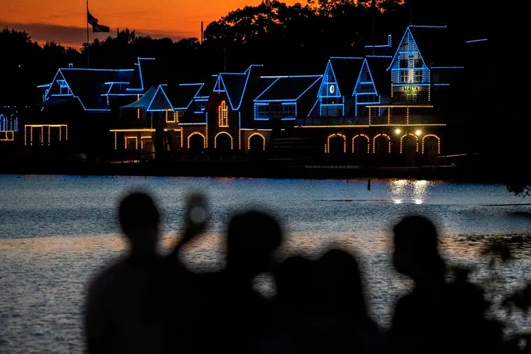 Boathouse Row is lighted in blue and gold June 9, 2020 in support of essential workers during the coronavirus pandemic. A year-long project to install LED lights that "dance" is nearly complete.