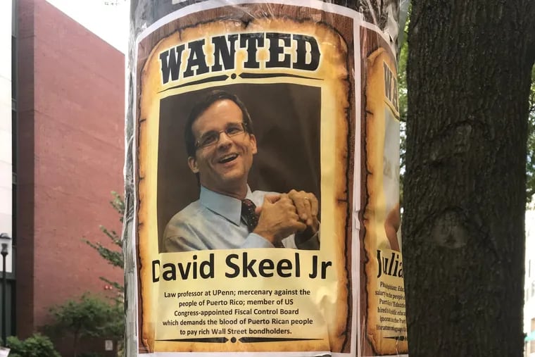 University of Pennsylvania Law School Prof. David Skeel, a bankruptcy expert and author of Debt's Dominion and other works on the history of American debt, is among the officials supervising Puerto Rico's fiscal reorganization, who have been targeted by the process's many critics. This "WANTED" poster of Skeel, by an anonymous protester, was taped to a utility pole in the summer of 2018 in front of the law school on 34th Street in Philadelphia.