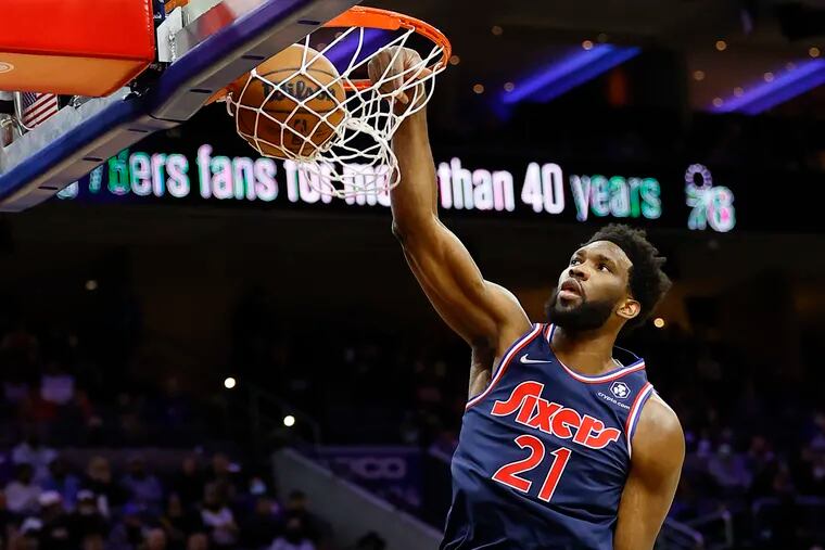 Sixers center Joel Embiid dunks the basketball against the Los Angeles Lakers on Thursday, January 27, 2022 in Philadelphia.