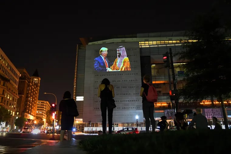 An image of President Donald Trump and Saudi Crown Prince Mohammed bin Salman is projected onto the Newseum in Washington, D.C., in October 2019 to mark the anniversary of Jamal Khashoggi's murder.