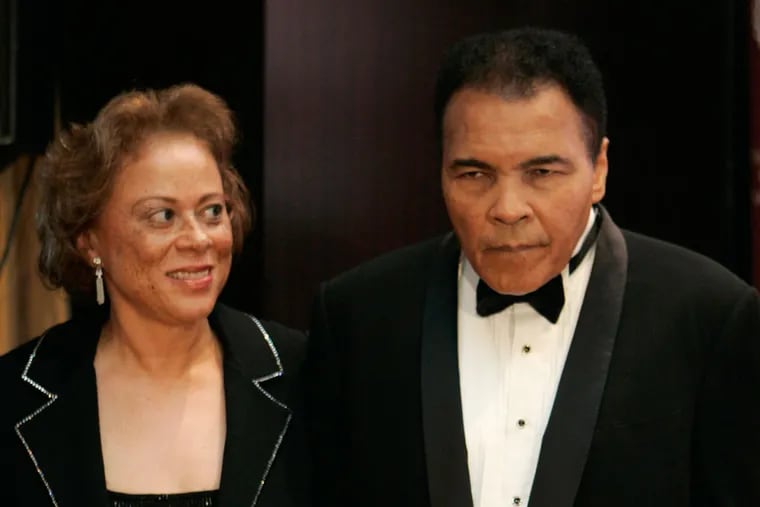 Muhammad Ali poses for photographs with his wife Yolanda before the Cold Spring Harbor Laboratory Inaugural Double Helix medals Gala in New York,in this Nov. 9, 2006 file photo.  (AP Photo/Frank Franklin II)