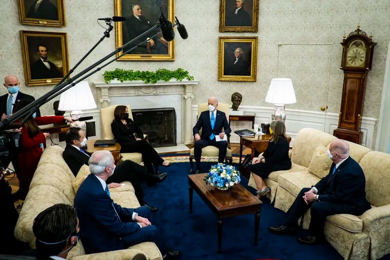 President Joe Biden and Vice President Kamala Harris meet with governors and mayors in the Oval Office earlier this month to discuss the American Rescue Plan.