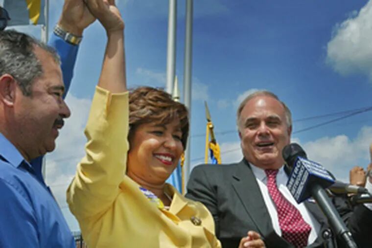 Maria Quinones Sanchez beams after being endorsed yesterday by Gov. Rendell (right) in her race for Council&#0039;s 7th District seat.