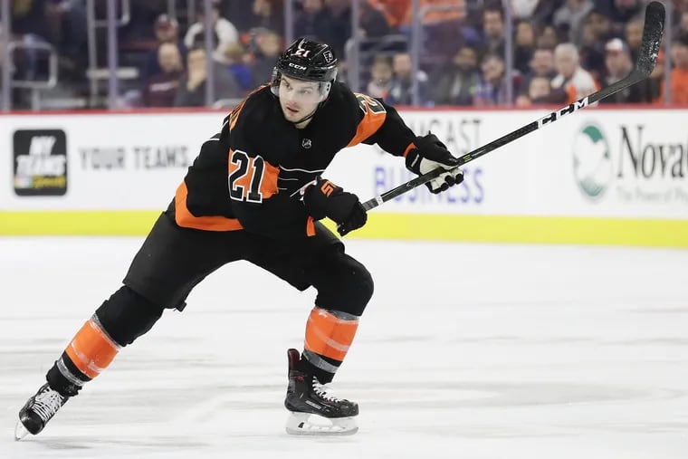 Left winger Scott Laughton skates against the New Jersey Devils in the Flyers' 5-2 win Saturday.