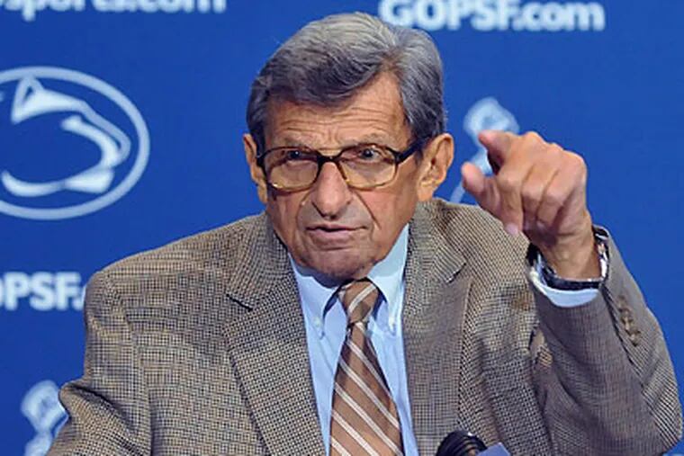 "That being upstairs is for the birds," Joe Paterno said of coaching from the press box. (Pat Little/AP)