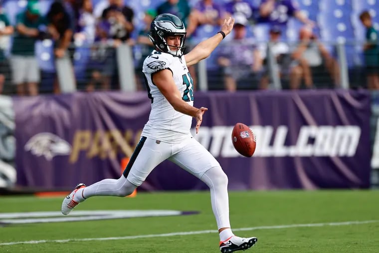 Eagles punter Arryn Siposs kicks the football during warm ups before the Eagles preseason game against the Baltimore Ravens at M&T Bank Stadium in Baltimore, MD on Saturday, August 12, 2023.