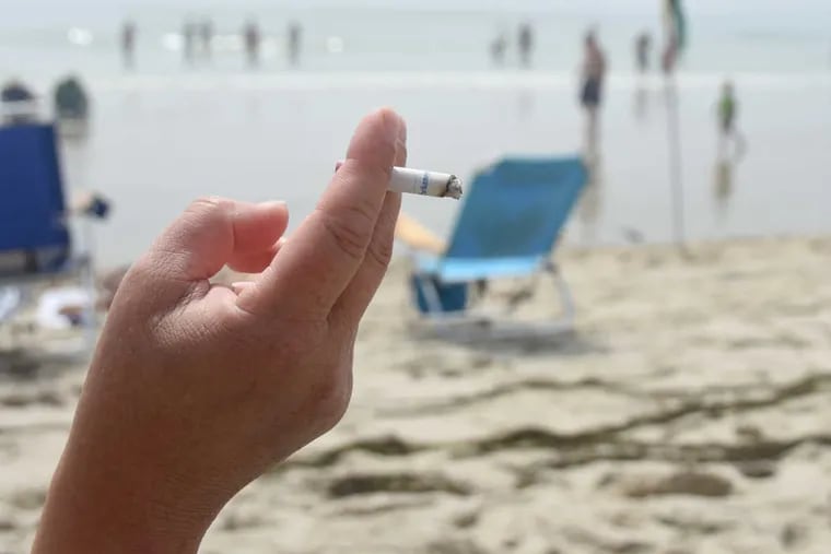 Smoking on the beach in Surf City, N.J. 