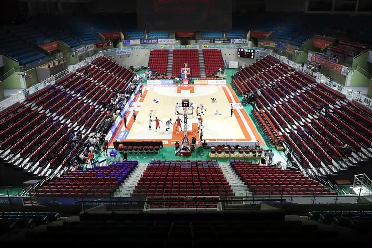 The stadium's seats were empty during the Korean Basketball League game between the Incheon Electroland Elephants and Anyang KGC clubs in Incheon, South Korea, on Feb. 26.
