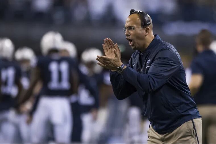 Penn State football coach James Franklin exhorts his team during the Big Ten Championship Game in Indianapolis December 5, 2016. The Nittany Lions received oral commitments from two recruits on Saturday.