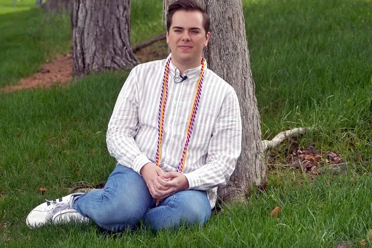 Matt Easton poses for a photograph as he sits in a park Monday, April 29, 2019, in Cottonwood Heights , Utah. Easton, A gay student who came out during a valedictorian speech at Mormon-owned Brigham Young University is earning applause and admiration from fellow students and figures like actress Kristin Chenoweth and the husband of gay Democratic presidential candidate Pete Buttigieg. (AP Photo/Rick Bowmer)