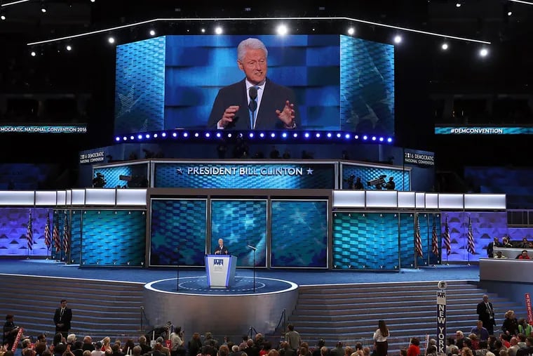 President Bill Clinton gestures while speaking to delegates during the second night of DNC at the Wells Fargo Center in South Philadelphia.