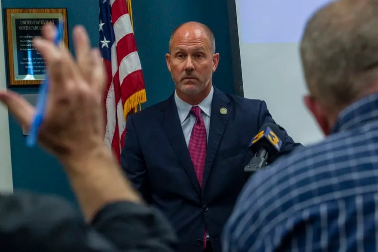 Pasquotank County District Attorney Andrew Womble answers questions from reporters after announcing he will not charge deputies in the April 21 fatal shooting of Andrew Brown Jr.