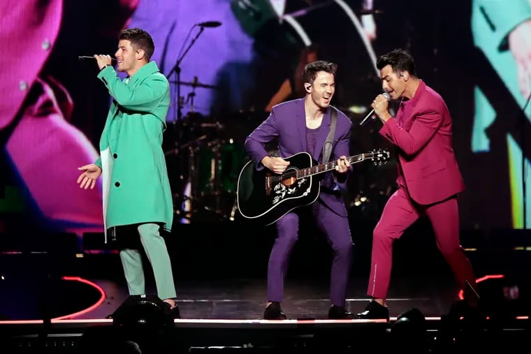The Jonas Brothers -- Nick, Kevin, and Joe -- at the Wells Fargo Center on their 2019 "Happiness Begins Tour."