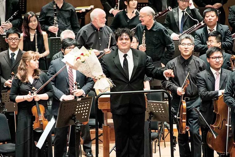 Christy takes a bow.The podium was shared by Cao Peng and the Orchestra's associate
conductor, Cristian MÄƒcelaru. PHOTO:Jan Regan / The Philadelphia Orchestra