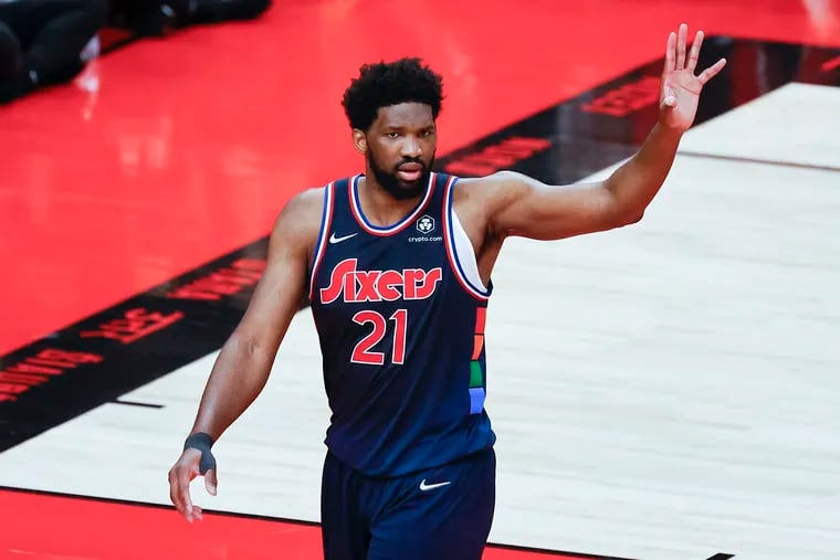 Sixers center Joel Embiid signals to his teammates against the Toronto Raptors in game six of the first-round Eastern Conference playoffs on Thursday, April 28, 2022 in Toronto.