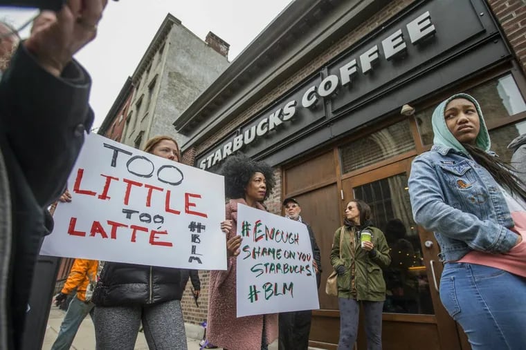 Protesters gathered Sunday outside the Starbucks where two black men were arrested Thursday after employees called police to say the men were trespassing.