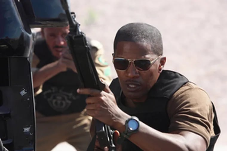 A box-office analyst called &quot;The Kingdom,&quot; starring Jamie Foxx, a &quot;Rambo-unctious action flick&quot; and wondered whether its jingoism would play in overseas markets.