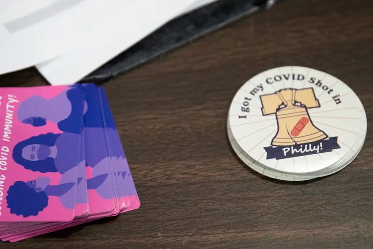 Philly-themed stickers are available for patients who’ve received their COVID-19 vaccine inside the Liacouras Center in Philadelphia on Tuesday, Feb. 02, 2021. The Black Doctors COVID-19 Consortium has been vaccinating Philadelphia residents.