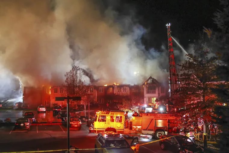Firefighters battle a five-alarm blaze at the Barclay Friends nursing home in West Chester.