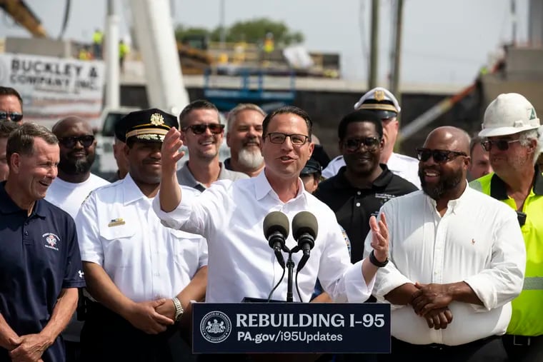 Gov. Josh Shapiro speaks during a news conference at the collapsed section of I-95 near Cottman and State Roads in Northeast Philadelphia on Tuesday. Shapiro announced that an interim roadway will open to drivers this weekend.