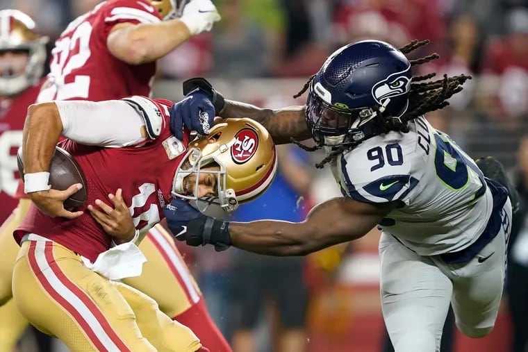 Seahawks defensive end Jadeveon Clowney gets his hands on 49ers quarterback Jimmy Garoppolo in Seattle's 27-24 Week 10 win. Clowney had 10 pressures in the game.