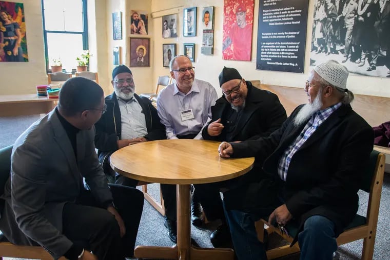 Rabbi Shawm Zevit (center) with leaders from other religious institutions that partner with Mishkan Shalom Synagogue in Philadelphia on Saturday, December 1, 2018. The synagogue celebrated the 10th annual Truah Human Rights Shabbat which focuses on the intersection of Jewish values and universal human rights.<br/>
ERIN BLEWETT / Staff Photographer