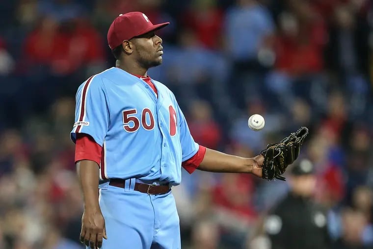 Phillies pitcher Hector Neris waits for the next batter a few moments after giving up the go-ahead home run in the 10th inning.