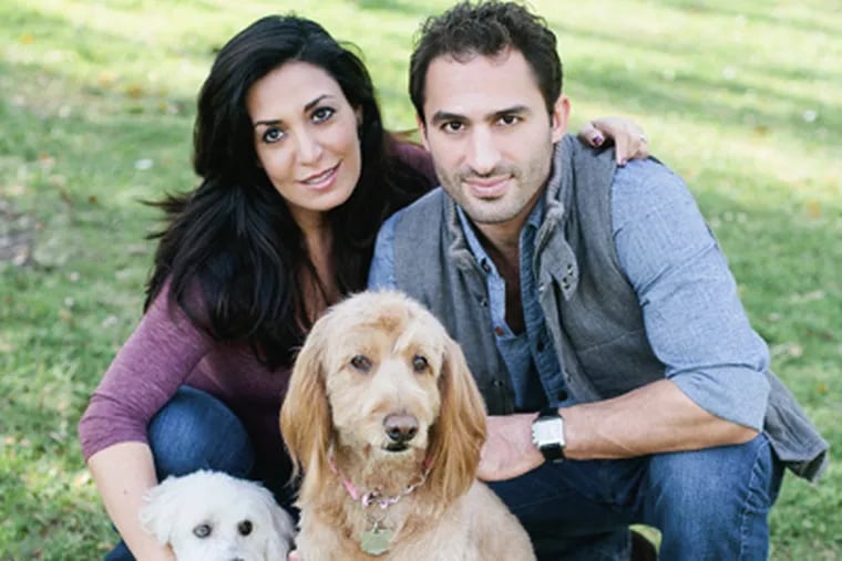 Karine and Aaron Hirschhorn with their Rambo and Rocky. They founded the DogVacay website, which pairs humans who vacation with dogs who don't.