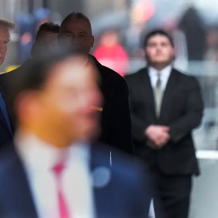 Former president Donald Trump leaves Trump Tower on his way to Manhattan criminal court on Thursday in New York.