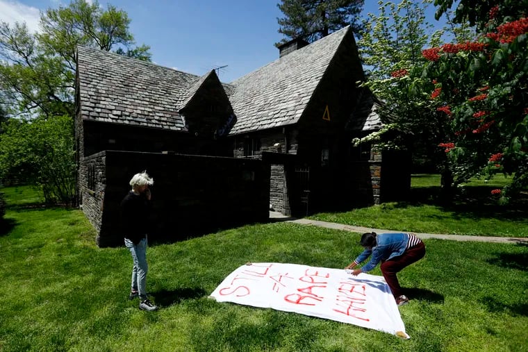 Swarthmore College students paint a banner to hang outside the Phi Psi fraternity house during a sit-in, Monday, April 29, 2019, in Swarthmore, Pa. Students at the suburban Philadelphia college have occupied the on-campus fraternity house in an effort to get it shut down after documents allegedly belonging to Phi Psi surfaced this month containing derogatory comments about women and the LGBTQ community and jokes about sexual assault. (AP Photo)
