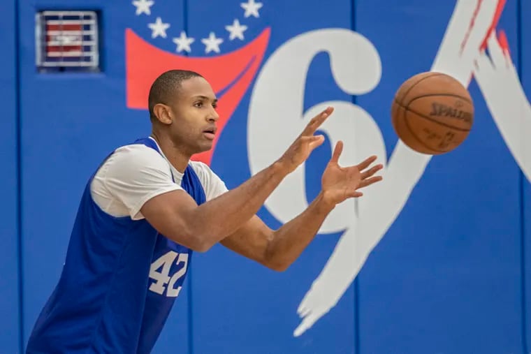 Sixers forward Al Horford catches a pass, in order to shoot, during  Sixers practice at their training facility in Camden NJ on October 16, 2019.