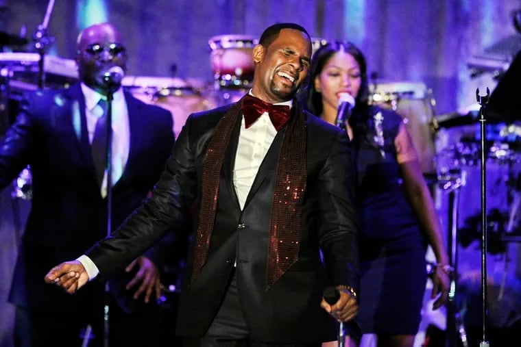 R. Kelly performs in 2011 at a Grammy gala.