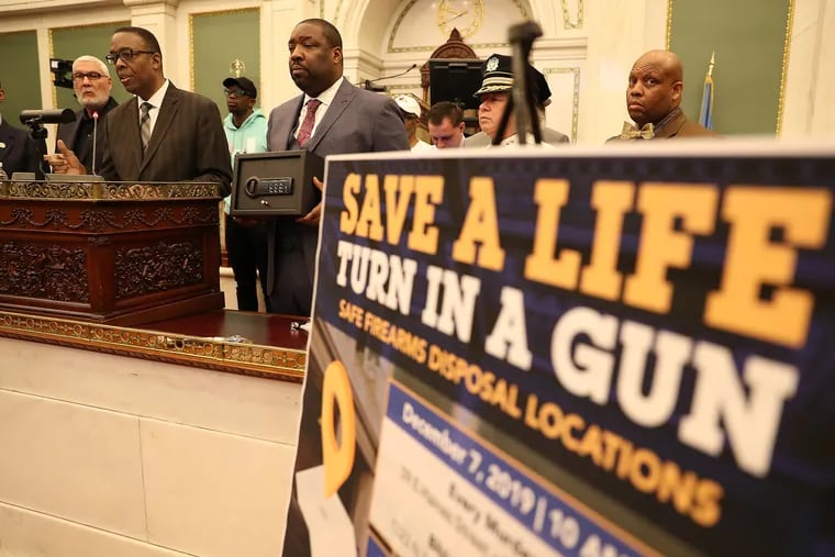 Philadelphia City Council president Darrell Clarke, second from left, speaks as council members hold a news conference with community anti-violence advocates urging the public to conduct “gun checks” in their homes to help protect children and communities from gun violence.