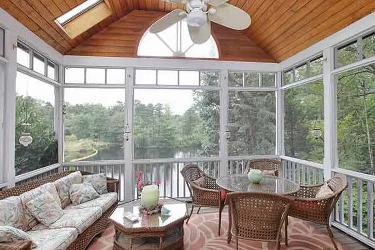 This Medford Lakes home, which overlooks Upper Aetna Lake, is on the market for $1.75 million.