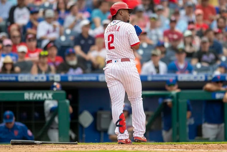 Phillies second baseman Jean Segura reacts after getting hit by a pitch in the sixth inning against the New York Mets.