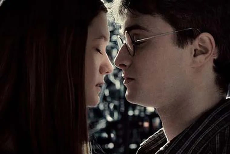 Bonnie Wright (left) and Daniel Radcliffe star in the new fantasy adventure <i>Harry Potter and the Half-Blood Prince</i>.