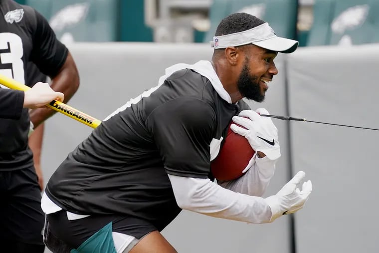 Miles Sanders (above) and the other Eagles running backs have a new position coach in Jemal Singleton.