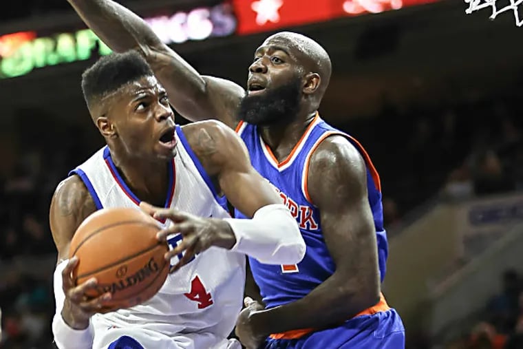 Sixers' Nerlens Noel goes up against Knicks' Quincy Acy  during the 4th quarter at the Wells Fargo Center in Philadelphia, Friday,   March 20, 2015. Sixers beat the Knicks 97-81.  (Steven M. Falk/Staff Photographer)